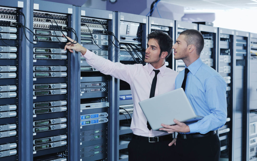 Technician working in server room
